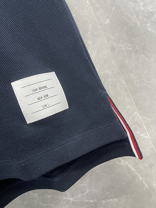 トムブラウンネットカラーのパールコットンポロTシャツ
