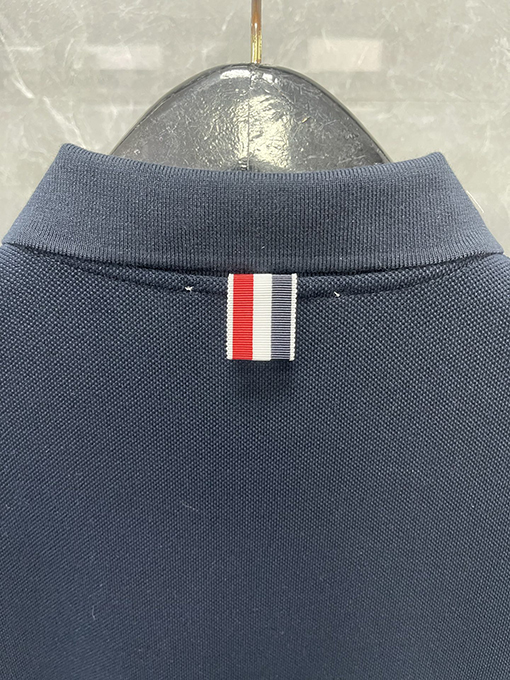 トムブラウンネットカラーのパールコットンポロTシャツ