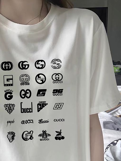 グッチ総柄ロゴカップル用ゆったりクルーネック半袖Tシャツ