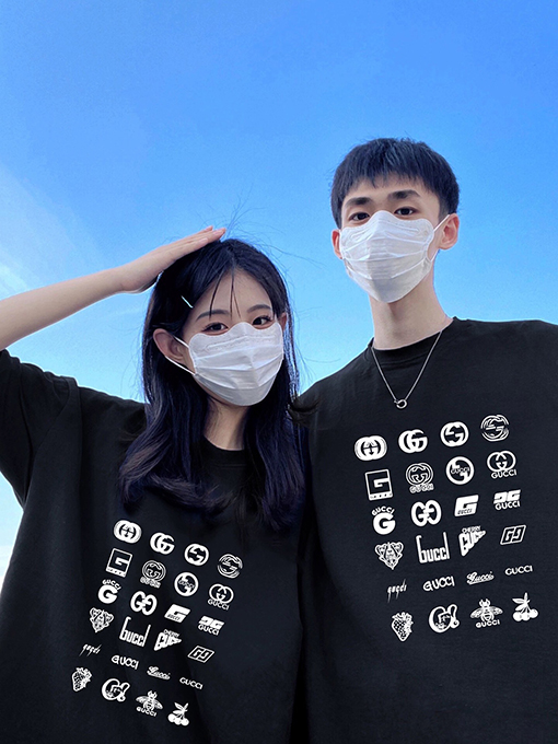 グッチ総柄ロゴカップル用ゆったりクルーネック半袖Tシャツ