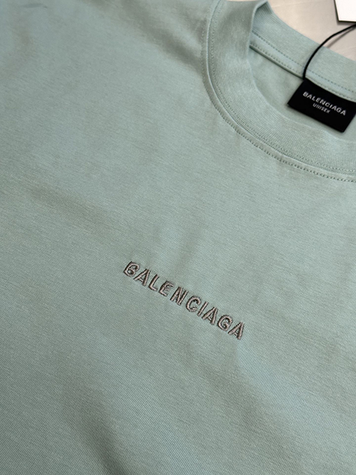 バレンシアガミントグリーンの刺繍スローガン半袖シャツ