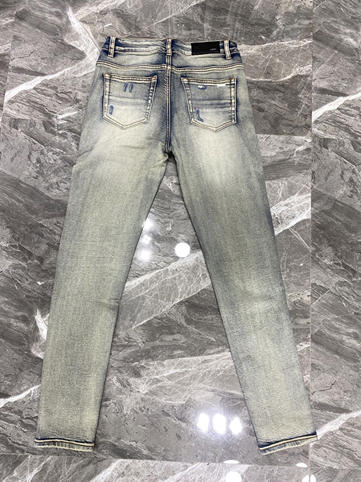 アミリ新しい穴の開いたファッションジーンズ