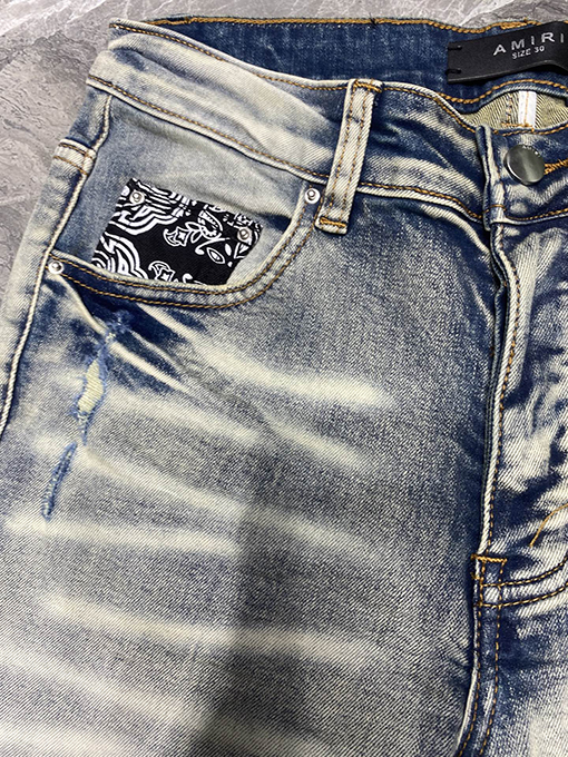 アミリ新しい穴の開いたファッションジーンズ