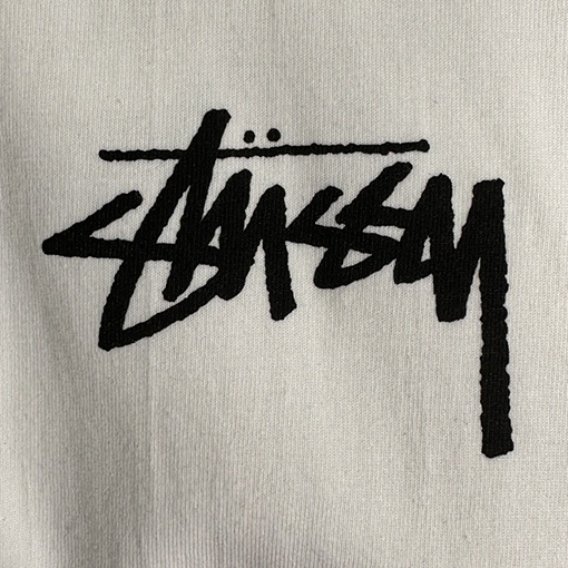 ステューシー ドールロゴ8号ボールプリント半袖Tシャツ