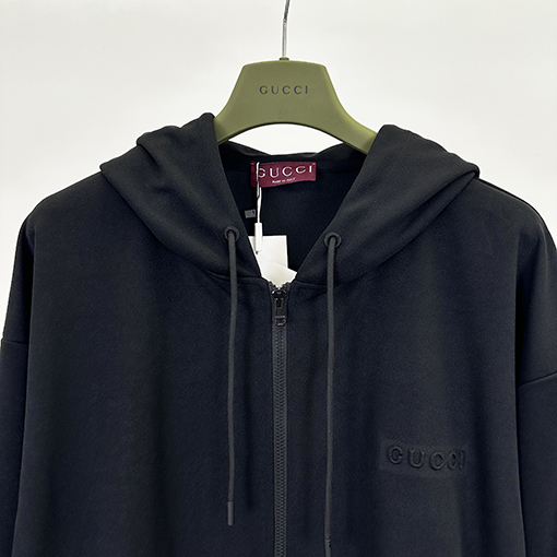 グッチ 黒と白のリブフード付きジッパージャケット
