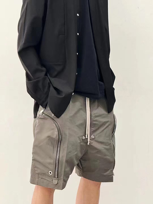リックオウエンスダークシリーズの大きなポケットジッパーパンツ