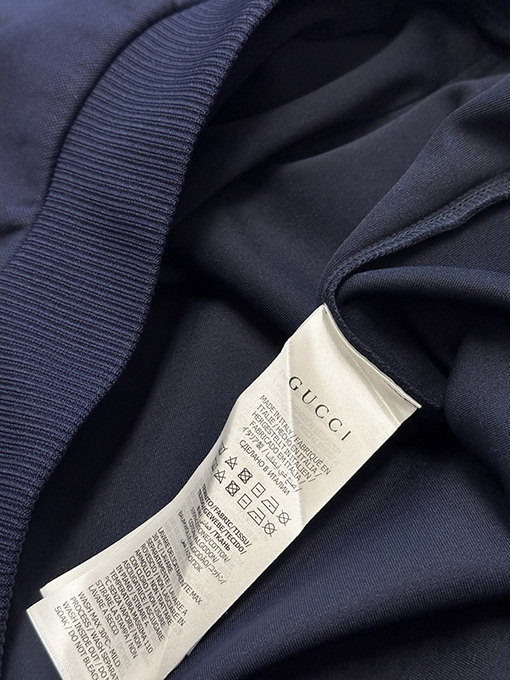 グッチ Gucci エンボスロゴジッパーパーカー