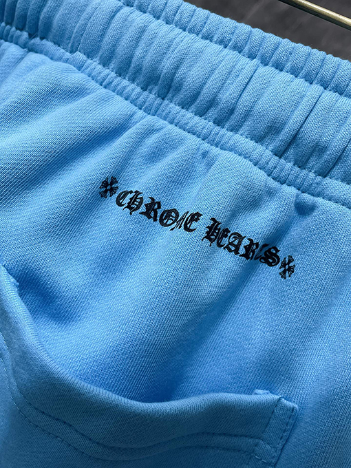 クロムハーツコピー落書き小さな赤い唇刺繍大きなポケットパンツ