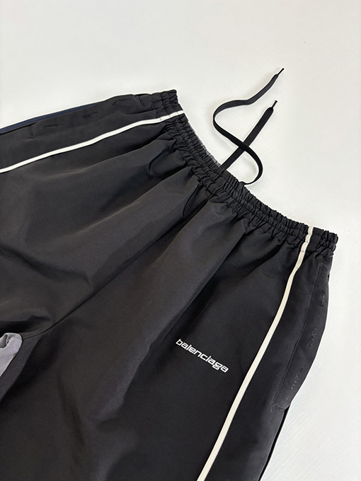 バレンシアガ Balenciag アルファベットロゴ刺繍対照色ステッチナイロンパンツ
