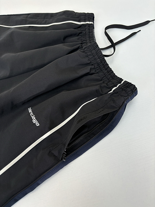 バレンシアガ Balenciag アルファベットロゴ刺繍対照色ステッチナイロンパンツ