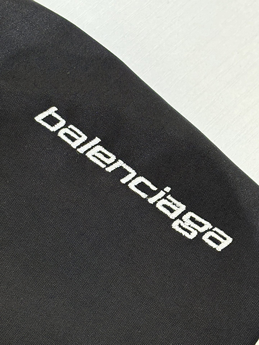 バレンシアガ Balenciag アルファベットロゴ刺繍対照色ステッチナイロンパンツ