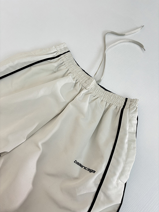 バレンシアガ Balenciag アルファベットロゴ刺繍対照色ステッチナイロンパンツ