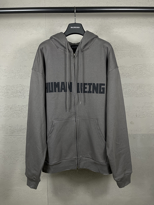 バレンシアガ HUMAN BEING 刺繍パッチ付きフード付きジップアップスパーカー