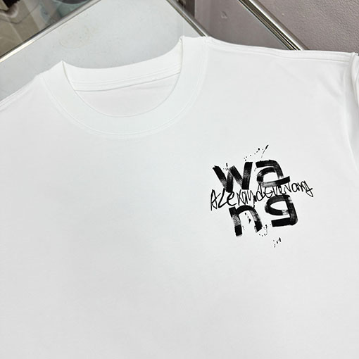 アレキサンダーワン Alexander Wang フロントとバックにデジタルダイレクトインジェクションレタリングプリントをした半袖Tシャツ