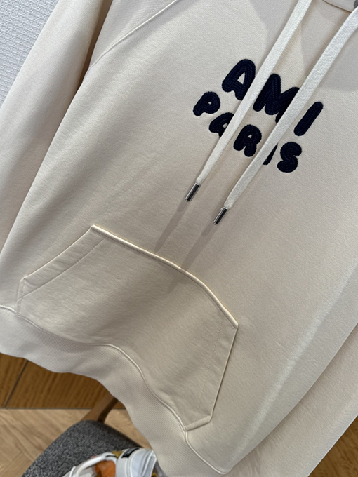 アミリコピー AMI PARIS 織り文字ロゴ入りパーカー