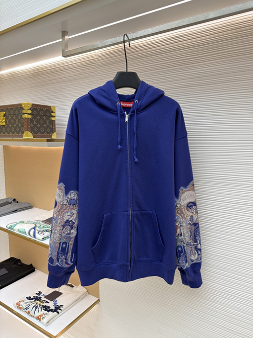 シュプリーム袖に目のプリント入りコラボレーションデザインのフード付きジップアップスウェットシャツ