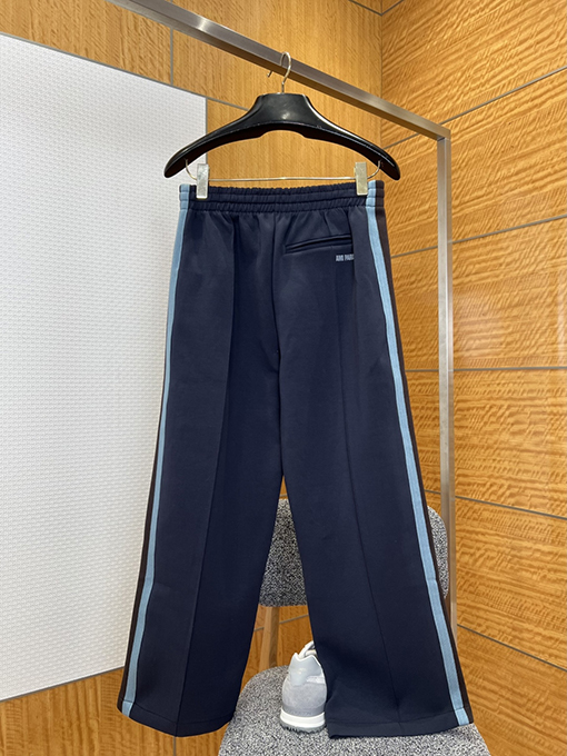 アミリコピー カラーブロックのサイドストライプ入りストレートレッグニットスウェットパンツ
