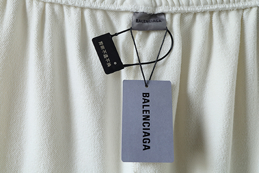 バレンシアガ BALENCIAGA クラシックな英字ロゴ刺繍とインクが飛び散ったようなデザインのカジュアルスポーツパンツ
