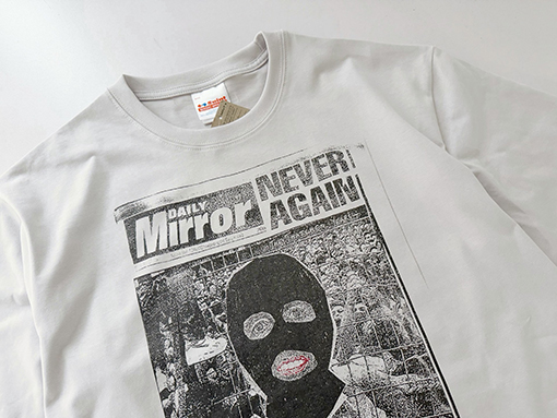 セントマイケルコピー NEVER AGAIN 新聞風マスク姿のポートレートコラージュプリント半袖Tシャツ
