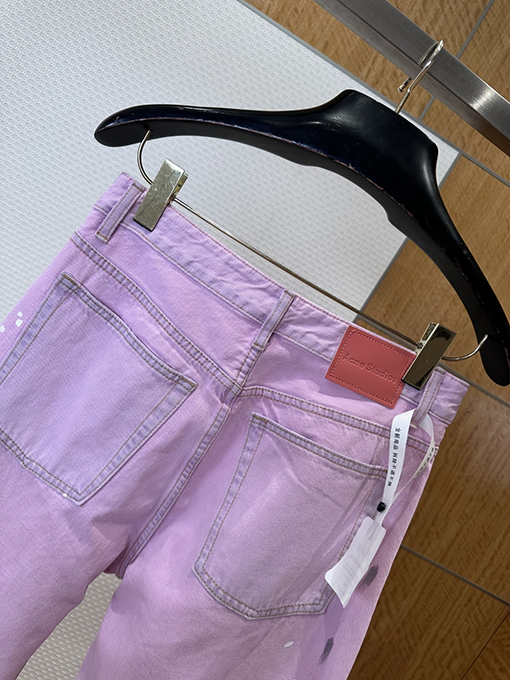 アクネストゥディオズ ピンクのスプラッターグラフィティ柄ワイドレッグジーンズ