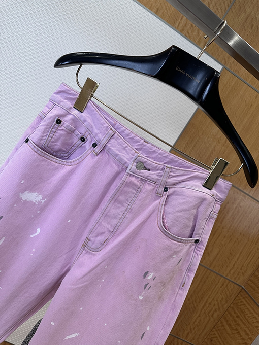 アクネストゥディオズ ピンクのスプラッターグラフィティ柄ワイドレッグジーンズ